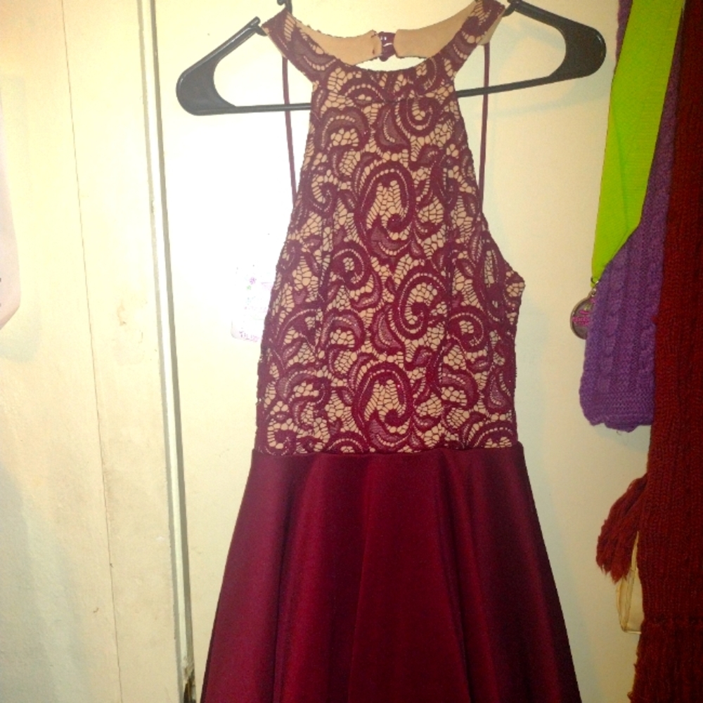 Cute short red dress.